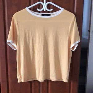 Summery yellow baggy tee with white trim